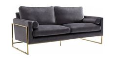 a gray velvet couch with gold legs and arm rests on a white background, the sofa is in front of an angled metal frame