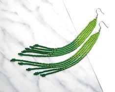 Beaded Earrings Exra Long Earrings Green Seed Bead Earrings - Etsy Green Beaded Earrings, Extra Long Earrings, Shoulder Duster Earrings, Duster Earrings, Long Dangle Earrings, Beaded Anklets, Earrings Green, White Jewelry, Beaded Fringe