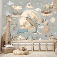 a child's room with a wall mural featuring animals and hot air balloons in the sky