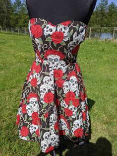 This is a hand made Alexander Henry cotton  50s dress. Full circle skirt, with underskirt and net.  May have faded slightly as it's been in my shop a while.  Bust -  Waist- Cotton Corset, Mesh Corset, Alexander Henry, Full Circle Skirt, Red Skull, Full Circle Skirts, 50s Dresses, Full Circle, Skull Print