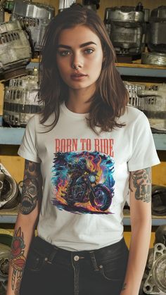 Rev up your wardrobe with our "Born to Ride" t-shirt, designed for those who love the open road, the roar of a bike, and the thrill of freedom. This shirt features a bold, retro-style graphic of motorcyclists tearing through a sunset, evoking a sense of adventure and rebellious spirit. 🏍️ Key Features: 👕 Premium Cotton Comfort: Soft, breathable, and durable fabric that keeps you comfortable all day long. 🎨 Vibrant Tattoo Art Design: High-quality print featuring motorcycle riders, flames, and a retro sunset, perfect for those who love bold, dynamic designs. ️ Unisex Fit: Available in various sizes, this t-shirt is designed to fit both men and women who embrace the biker lifestyle. 🎁 Great Gift Idea: Perfect for birthdays, holidays, or any occasion for motorcycle lovers, bikers, and free Tattoo Art Design, Born To Ride, Biker Lifestyle, Retro Sunset, Motorcycle Riders, Vintage Motorcycle, Dynamic Design, Open Road, Tattoo Art