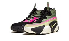 The Nike React Frenzy “Spiral Sage” is a neutral look for the futuristic shoe by Nike that shows appreciation for Japanese workwear principals and ‘90s performance basketball shoes.  While not a basketball shoe, the React Frenzy looks the part while bringing serious comfort for off court use thanks to its responsive React foam midsole.  Up top, the shoe displays an olive green textile upper with wavy pink and light olive green accenting above a green Swoosh logo on the lateral side.  The medial Japanese Workwear, Adidas Ultraboost 20, Piercing Industrial, Futuristic Shoes, Kicks Shoes, Shoe Display, Mens Nike Shoes, Nike React, Fresh Kicks