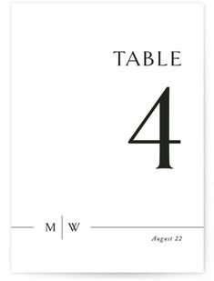 a table number card with the number four in black and white, on a white background