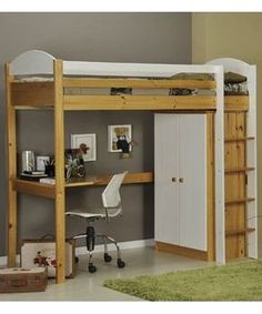 there is a loft bed with a desk and ladder in the room next to it