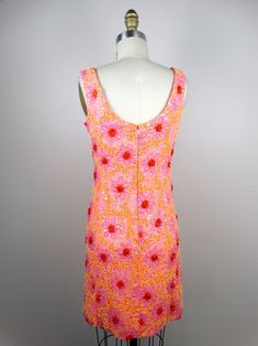 "This is an exquisite 60's vintage dress beautifully detailed and completely hand beaded. It's in perfect condition! The best thing is - it has pockets Measurements: Bust - 32\" Waist - 26\" Hips - 35\" Length - 34\" This dress comes from a pet-free and smoke-free home. If you would like more info or have any questions, please don't hesitate to ask!" Vintage Sequin Dresses For Spring, Pink Vintage Sequin Dress, 70s Sequin Dress Vintage, Vintage Red Sequin Dress, Vintage Pink Sequin Dress, Red Vintage Sequin Dress, Vintage Pink Sequined Dresses, Vintage Fitted Sequin Embellished Dress, 1970s Fitted Multicolor Dresses