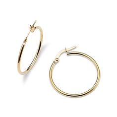 These hoop earrings feature a classic look with a slim  rounded profile and a lightweight feel  making them perfect for daily wear. A latch back keeps these beautiful 14-karat yellow gold hoops secure. Gold Hoops, Classic Looks, Daily Wear, Hoop Earrings, Yellow Gold, Yellow, Gold, How To Wear