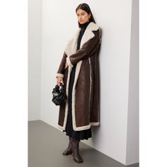 Brown faux shearling (100% Polyester). Jacket. Long sleeves. Collar. Front button closure. 47" from shoulder to hemline. Imported. Shearling Long Coat For Work, Polyester Jacket, Simon Miller, Rent The Runway, Jacket Long, Closet Designs, Shearling Coat, Winter Jackets, Long Sleeves