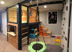 a child's play room with bunk beds and toys in the corner, on top of carpeted flooring