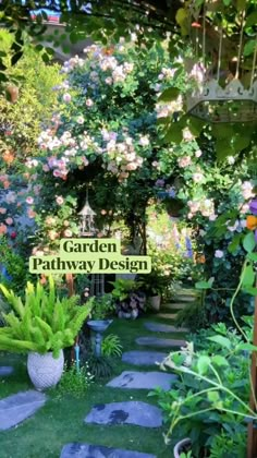 the garden pathway is surrounded by flowers and plants