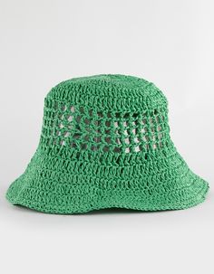 a green crocheted hat with holes on the brim and side, sitting against a white background