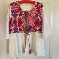 New With Tags Women’s Off-White, Colorful Tapestry, Double Tassel Tie Closure, Open Front, 3/4 Sleeve Festival Boho Top Wrap. Measurements Laying Flat: Armpit-Armpit 24“ Sleeves 18” Length 27.5” 100% Cotton Bohemian V-neck Blouse With Tassels, Printed V-neck Kimono For Festival, Green Lace Top, Festival V-neck Printed Kimono, Pink Bohemian V-neck Kimono, Multicolor Peasant V-neck Top, Hippie Blouse, Boho Embroidery, Colorful Tapestry