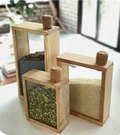 two small wooden blocks sitting on top of a table