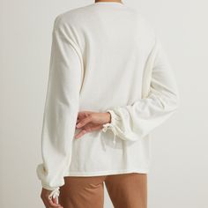 Designed in collaboration with The Curated, this long sleeve top features a v-neckline, and is crafted from a soft silk and linen blend. White Long Sleeve Cashmere Top, White Cashmere Long Sleeve Tops, V-neck Fine Knit Daywear Sweater, Knit V-neck Top For Daywear, Fine Knit V-neck Daywear Sweater, Fine Knit V-neck Sweater For Daywear, Long Sleeve Cotton V-neck Top For Fall, White Cashmere Tops For Spring, Spring Long Sleeve V-neck Sweater For Layering