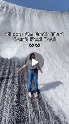 a woman standing on top of a snow covered slope with text overlay that reads, places on earth that don't feel real