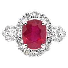 A beautiful ring set in Platinum featuring a GIA Certified 2.39 Carat Natural Ruby and 0.55 Carat Diamonds. Rubies are referred to as "Ratnaraj" in Sanskrit meaning the King of Gems. Early cultures treasured rubies for their similarity to the redness of the blood that flowed through their veins, and believed that rubies held the power of life. The ring is made in Japan. Ring size and stamping detailed below. Contact Us for more information. If required, we can adjust the ring size free of cost. Gia Certified Fine Jewelry Ruby Ring In Platinum, Gia Certified Platinum Ruby Ring In Fine Jewelry, Gia Certified Platinum Ruby Ring, Luxury Gia Certified White Gold Ruby Ring, Luxury Ruby Cluster Ring With Center Stone, Luxury Cluster Ruby Ring With Center Stone, Exquisite Gia Certified Ruby Diamond Ring, Gia Certified Classic Ruby Ring With Diamond Accents, Formal Gia Certified Cushion Cut Ruby Ring