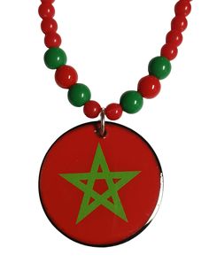 Introducing these stunning Red Moorish Flag Bead Necklaces! As a proud supporter of the Moorish American community and the rich heritage of Al Morocco, this necklace represents more than just a piece of jewelry. It symbolizes Love Peace Truth Freedom & Justice, and also cultural pride. With its intricate design and bold red chain, it's a statement piece that will catch the eye and inspire the heart. Wear it with pride and honor your connection to the Nations of Moors. Available in both, 2", and Traditional Beaded Necklace With Round Pendant As Gift, Symbolic Red Round Beads Jewelry, Traditional Red Medallion Necklace, Traditional Christmas Celebration Jewelry, Traditional Red Round Pendant Necklace, Traditional Red Necklace With Round Pendant, Symbolic Round Beads Necklaces For Gifts, Symbolic Round Beads Necklaces As Gift, Festive Red Round Pendant Necklace