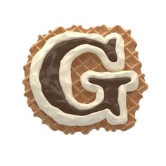 the letter g is made from waffles with chocolate and icing on top