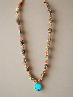 Crafted with vintage #8 turquoise beads, stunning faceted sunstone beads, and a beautiful Kingman turquoise pendant, this necklace is a true statement piece! At 16 inches long with a one inch extender, it can be adjusted for the perfect fit. Artisan Turquoise Necklace With Faceted Beads, Bohemian Turquoise Necklace With Faceted Beads For Gift, Bohemian Turquoise Necklace With Faceted Beads, Hand-strung Turquoise Necklace For Festivals, Festival Hand-strung Turquoise Necklace, Bohemian Hand-strung Turquoise Beaded Necklaces, Spiritual Turquoise Amazonite Beaded Necklaces, Spiritual Turquoise Amazonite Beaded Necklace, Bohemian Multicolor Turquoise Necklace With Faceted Beads