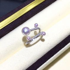 Highline: Famous Style Product Information OriginJapan MaterialAkoya Pearl, 18k Gold, and Diamond Dimensions- Pearl Shaped: Round Size: 3-4 mm & 7-8 mm Quality: AAA Nacre: Very Thick Color: Rose Overton Luster: Very High Accessories Metal: 3.2g of 18k White Gold Other: 0.38ct of SI Quality Natural Diamond Aaa Quality Diamond Ring Jewelry, Elegant Aaa Quality Sterling Silver Rings, Gift Akoya Pearl Rings With Brilliant Cut, Brilliant Cut Akoya Pearl Ring As Gift, Brilliant Cut Akoya Pearl Rings For Gift, White Gold Akoya Pearl Ring As Gift, White Gold Akoya Pearl Jewelry With High Luster, Aaa Quality White Gold Sterling Silver Rings, Akoya Pearl Rings With Brilliant Cut For Gift