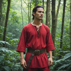 This Vibrant Red Forest Ranger Tunic is a captivating blend of historical inspiration and modern flair, perfectly suited for the adventurous man. The rich red hue stands out in any setting, embodying the spirit of both the untamed wilderness and the colorful pageantry of medieval times. Made from durable, high-quality materials, this tunic ensures comfort and longevity, whether worn for outdoor adventures or cosplay events. The design features traditional elements such as a lace-up front and rei Adventure Costume, Adventurous Men, Nature Explorer, Designer Image, Forest Ranger, Red Forest, Medieval Style, Medieval Costume, Medieval Times