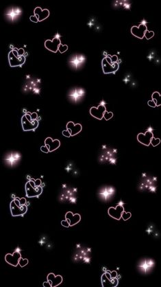 hearts and stars on a black background