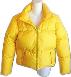 Yellow Winter Puffer Jacket, Yellow Winter Outerwear For Cold Weather, Yellow Spring Puffer Jacket, Yellow Puffer Jacket For Winter, Yellow Long Sleeve Puffer Outerwear, Yellow Casual Spring Puffer Jacket, Yellow Casual Puffer Jacket For Spring, Casual Yellow Puffer Jacket For Spring, Casual Yellow Spring Puffer Jacket