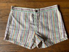 "Vintage 1970s surfer style striped short shorts.  Great vintage condition. Clean, no visible signs of wear.  No size listed. Please review measurements as some vintage items fit smaller than modern sizing. Measurements taken with garment laid flat: 15.5\" across waist 10.5\" length in front 12\" length in back 2\" inseam, from intersection to hem 10\" rise, from intersection to top of waist Please send a message if you have any questions. Double check measurements and inspect all pictures caref Cool Vintage, Surfer Style, Skorts, Striped Shorts, Short Outfits, Casual Shorts, Womens Shorts, Bathing Beauties, Clothes For Women