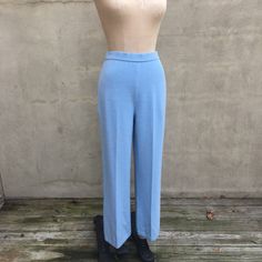 "Pristin 90's Vintage condition with no flaws to note, clean! Timeless! Subtly stand out wearing these luxurious understated pants in a beautiful weight, perfect year-round, virtually wrinkle-free and eternally fashionable. True classic American authentic St. John Collection line by Marie Gray! Stretchy, unlined, elasticized waist, reinforced hems, pull-on style. Please note the crease can be ironed out. Powder blue. Waist 12-14\" Hips 17.5\" Inseam 27\" Length 36-3/4\" Leg opening at hem 8.5\"" Stretch High-waisted Pants For Daywear, Classic Straight Pants For Loungewear, Classic Loungewear Trousers, Fitted High Waist Pants For Casual Wear, High Waist Fitted Pants For Daywear, Elegant Stretch Pants For Daywear, Fitted High Waist Pants For Daywear, Stretch Straight Pants For Daywear, Classic Bottoms For Daywear