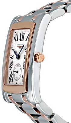 L5.655.5.71.7 | L56555717 LONGINES DOLCEVITA TWO TONE ROSE GOLD & STEEL MEN'S LUXURY WATCH - With Manufacturer Serial Numbers - Swiss Made - Silver Dial - Blue Roman Numeral Hour Markers - Minute Markers Around Outer Rim - Blue Sword Shaped Hands - Polished Solid 18k Rose Gold Bezel - Date Feature - Small Seconds Sub-Dial at 6 O'Clock - End of Life Indicator (EOL) - Battery Operated Quartz Movement - Longines Caliber L176 - Jewels: 15 - 3 Year Warranty - Guaranteed Authentic - Certificate of Authenticity - Manufacturer Box & Manual - Polished Stainless Steel Case - Polished Stainless Steel with Solid 18k Rose Gold Bracelet - Scratch Resistant Sapphire Crystal - 30 Meters / 100 Feet Water-Resistant - 32.10mm x 26.30mm = 1 1/4" x 1" Case, 7" Adjustable Bracelet - Display Type: Anaolg - Case Rolex Women, Bracelet Display, Display Type, Authentic Watches, Rose Gold Case, Free Bracelet, Roman Numeral, Rose Gold Bracelet, Mens Luxury