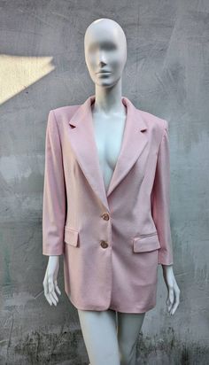 Vintage elegant wool long blazer from ESCADA. Jacket fastens with 2 buttons and has 2 pockets. Size tag 40, fits like S-L (see measurements) Condition 8/10 (last photo) Made in Italy Underarm to underarm - 53 cm/20.8" Shoulder to shoulder - 44 cm/17.3" Waist - 48 cm/18.9" Length from the back - 78 cm/30.7" Sleeve length  - 57.5 cm/22.6" All measurements taken with garment lying flat.  Vintage sizes vary greatly! We recommend comparing measurements with a similar style garment you own for best fi Classic Pink Blazer With Lapel Collar, Classic Pink Blazer With Pockets, Classic Pink Blazer With Notch Lapel, Classic Pink Winter Blazer, Classic Pink Outerwear For Office, Pink Notch Lapel Outerwear With Single Button, Pink Business Blazer With Button Closure, Pink Winter Formal Blazer, Winter Pink Formal Blazer