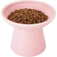 a pink bowl filled with lots of dog food