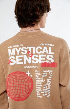 the back of a man's brown sweatshirt with red and white graphic on it