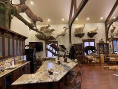 a large room filled with lots of fake animals