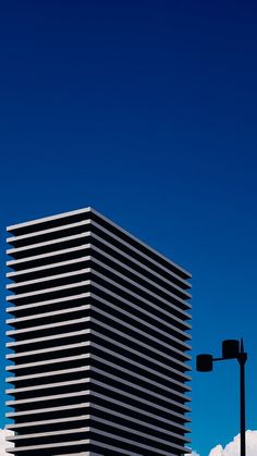 a tall building sitting next to a traffic light