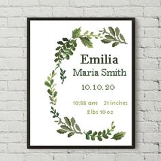 a cross stitch pattern on a white brick wall with the words, name and date