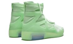 The Nike Air Fear of God 1 “Frosted Spruce” is vibrant green edition of Jerry Lorenzo’s flagship collaborative silhouette with Nike.  Up until the release of this “Frosted Spruce” colorway and an equally as eye-catching “Orange Pulse” version, the Fear of God 1 had only released in neutral tones like black and light grey.  This release takes things up a few notches with a bright green shade across the entire upper as well as the sculpted midsole in a translucent treatment.  The large visible Zoom Air unit in the heel contrasts with a clear blue window.  The basketball performance meets high-end streetwear sneaker by Lorenzo released in limited quantities in this “Frosted Spruce” colorway on June, 1, 2019. Nike Air Fear Of God, 70s Converse, Nike Airmax 97, Nike Airmax 95, Nike X Travis Scott, Ugg Ultra Mini, Converse Run Star Hike, Converse Run, Nike Airforce 1