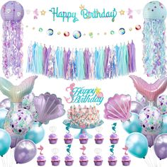 a birthday party with mermaid decorations and balloons