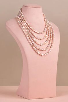 22k gold plated layered necklace with pink pearl and baroque embellishment.
Type: Baroque, Pearl: Natural
Composition: Hypoallergenic Brass
Color: Pink
Weight (in gm): 0.75
Size L (in cm) : 20 - Aza Fashions Pearl Layered Necklace, Rice Pearl Necklace, Palm Cuff, Pink Baroque, Pearl Embellishment, Jewellery Necklaces, Contemporary Necklace, Hand Accessories, Greek Jewelry