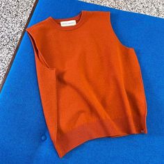 The extreme cashmere no.156 be now top is a classic crewneck sweater vest with a rib knitted neck and waistline.    one size. unisex    88% cashmere 10% nylon 2% spandex.    shoulder to shoulder: 39cm.  chest: 53cm.  hem width: 43cm.  total length: 55cm.    care: to retain its quality for a long time cashmere requires some special care. cashmere loves water. wash it regularly in a machine on a wool program (30ºc 600rpm) using wool detergent or baby shampoo and no softener. put each garment in a separate washing bag or pillow case. do not run a cycle with more than three garments at once.    after washing dry the garment flat on a towel. iron at low temperature using always a damp cloth between the iron and the cashmere. store the garment folded.    "one material one size for everybody and Classic Crew Neck Sweater Vest For Fall, Classic Fall Sweater Vest With Crew Neck, Crew Neck Fine Knit Sweater Vest For Layering, Crew Neck Vest For Workwear In Fall, Fall Crew Neck Sweater Vest For Work, Fall Crew Neck Vest For Workwear, Fall Workwear Sweater Vest With Crew Neck, Fall Crew Neck Vest, Crew Neck Sweater Vest