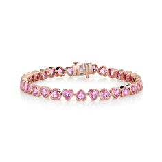 SWEETHEART COLLECTION: The SHAY Pink Sapphire Bezel Heart Tennis Bracelet. This item is in stock and ready to ship in 1 - 3 days. 18K Rose Gold: approx 11.08gr Pink Sapphire: approx 9.94 cts Dimension: 4mm Size: 6.5in Closure: Box with Tongue & Safety Clasp Natural, untreated gemstones Product Number: SB421 All GBP & EUR pricing includes duties & taxes. We offer complimentary International shipping and 2 day shipping within the US. For estimated delivery lead times, please see our shipping guide Pink Adjustable Tennis Bracelet, Adjustable Pink Tennis Bracelet, Pink Tennis Bracelet As A Gift, Heart Tennis Bracelet, Pink Gemstone Bracelet, Ring Chart, Rose Gold Pink, Sapphire Bracelet, Fire Heart