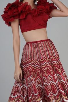 Red metallic skirt with sequin and thread embroidery all over and a frilled hem. Paired with a ruffled padded blouse. - Aza Fashions Padded Blouse, Red Lehenga, Metallic Skirt, Red Thread, Thread Embroidery, Fashion App, Aza Fashion, Online Design, Lehenga