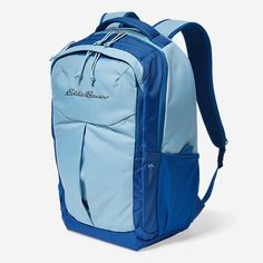 a blue backpack sitting on top of a white floor