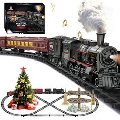 a toy train set with christmas tree and musical notes on the track, along with an ornament