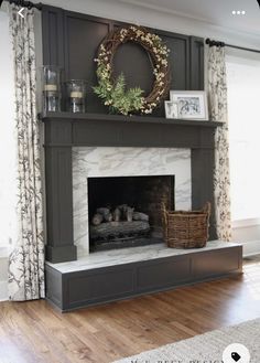 a fireplace with a wreath on top of it