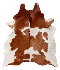 a brown and white cowhide rug on a white background