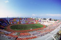 a baseball stadium filled with lots of people