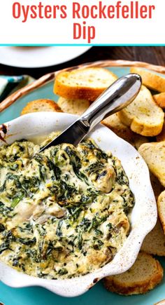 a plate with bread and spinach dip on it, next to some crackers