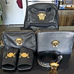 This Bundle Includes. Gianni Versace Logo Leather Backpack Medusa-Plaque Clutch Bag Unisex Calf Leather - One Size Versace Medusa Plaque Cluth Bag Le Greco Medusa Head Belt 95/38 Versace Medusa Biggie Flat Slides Mens Size 44 All Items Are Brand New, Never Worn Or Used, Just Sitting In My Closet. The Total Value Of All 5 Pieces Is Over $5600.00. Designer Leather Bags With Logo, Elegant Bag With Designer Logo For Everyday Use, Luxury Black Bag With Designer Logo, Designer Backpack For Formal Occasions, Designer Formal Backpack, Versace Backpack, Versace Bag, Black Cosmetics, Backpack Gift