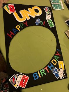 an uno happy birthday sign is displayed on a table