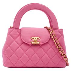 Introducing the Chanel Small Shopper Tote in dark pink size small. The bag is made from jersey fabric with a quilted stitch. Accentuated by aged gold hardware, including the signature CC turn-lock on the front flap. The dual top handles and long crossbody chain strap add versatile carrying options. The fold-over flap opens to a compact interior in matching leather with a zip pocket. Authenticated by real Authentication. Category, retail. Size: Small Color: Pink Material: Jersey 23K (RFID chip) Y Luxury Bags Collection, Pink Quilts, Cute Nike Shoes, Cute Nikes, Chanel Vintage, Pretty Bags, Shopper Tote, Shopper Bag, Coco Chanel